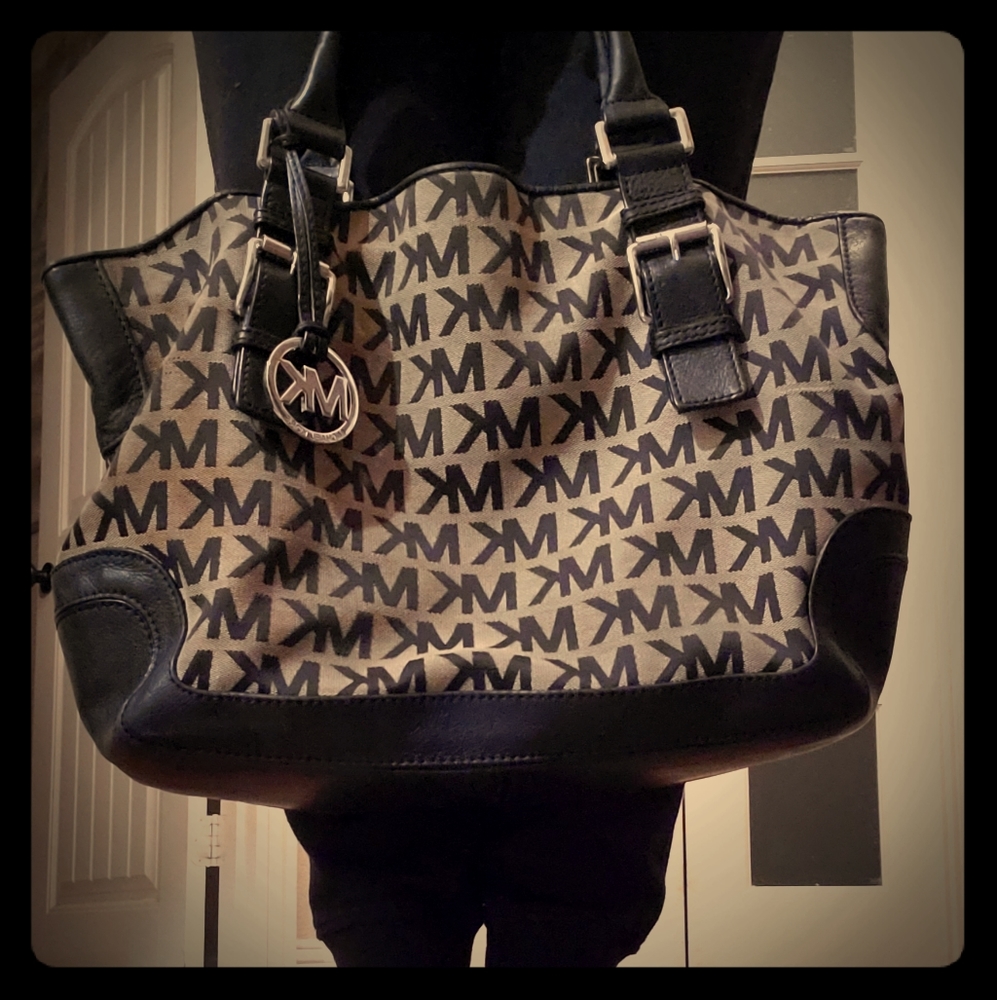 Michael Kors black leather handbag